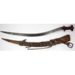 Ethiopian early shotel sword with original leather scabbard and buckle. Blade highly decorated.