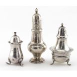 Two silver peppers and one silver salt. All hallmarked, includes a Victorian 1892 pepper. Total