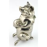 Silver plated novelty vesta in the form of a pig, stood on its rear legs and holding a sack, stamped