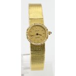 Ladies yellow metal (tests as 18ct) cased Zenith quartz wristwatch. the octagonal diamond ? bezel on