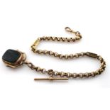 9ct gold "T" bar pocket watch chain with swivel pendant. Approx length 30cm, total weight 23.4g
