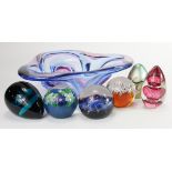 Glass Paperweights. A collection of six glass paperweights, makers include Caithness, Wedgwood,