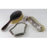 Art Nouveau silver mounted clothes brush and mirror, both hallmarked Birmingham, 1904 and a silver &