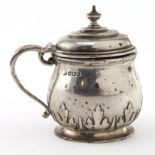 Silver mustard pot, hallmarked Sheffield 1911. Weighs 4.5oz.