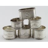 Six silver napkin rings, five with various British hallmarks and one with Continental marks (