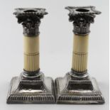 Pair of early Edwardian Silver and carved ivory corinthian column candlesticks by Thomas