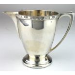 Silver cream jug, has rubbed marks, probably Birmingham 1942. Weighs 4oz approx.