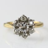 18ct yellow gold daisy cluster seven stone diammond ring with total diamond weight approx. one