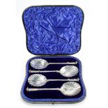 Boxed set of four large fruit spoons, lovely quality, hallmarked J.W.F.C.W., London, 1897. Weight of