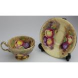 Aynsley. A cup and saucer by Aynsley, with fruit and gilt decoration, each piece bear the