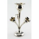 Small silver Epergne with three detachable vases and a large central vase with a loaded base.
