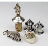 Mixed lot of two unmarked silver pepper pots, unmarked silver squirrel (the top of a baby's rattle),