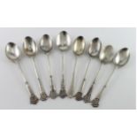 Mixed lot of eight silver golf spoons, comprising of seven hallmarked M.H.G.C., and one other