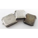 Two silver vesta cases, hallmarked Birmingham 1901 and 1913, plus one silver plated vesta, all three