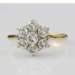 18ct yellow gold diamond seven stone daisy cluster ring with known total diamond weight of one and a