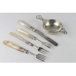 Four Mother of Pearl and silver pieces of flatware comprising three forks and one knife various