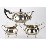 Three piece silver tea-set hallmarked Birm, 1911 (marks on sugar basin very worn but readable).