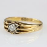 18ct yellow gold gypsy ring with fluted shoulders set with single diamond weighing approx. 0.25ct,
