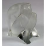 Lalique glass figure, depicting a crouching female, signed to base, height 60mm approx.
