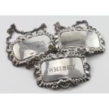 Three modern silver wine/spirit labels (brandy, whisky and sherry). Hallmarked Birmingham 1969/1970.