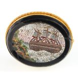 Micro mosaic Brooch in a yellow metal frame (tests 9ct) depicting a sailing ship, weight 17.7g