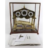 Devon Clocks. A Congreve type brass mantel clock, by Devon Clocks, based on the design by William