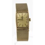 Mid-size 9ct cased Omega automatic wristwatch circa 1967. The rectangular gilt dial with gilt