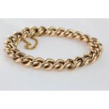 15ct Gold Gents Curb Bracelet with safety chain weight 31.6g