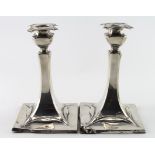 Pair of silver loaded Art Nouveau candlesticks. Hallmarked Walker and Hall, Sheffield, date letter