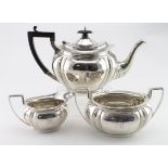 Three piece silver tea set comprising teapot, cream jug and sugar bowl. Hallmarked JD WD Sheffield