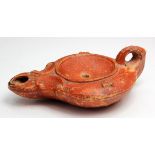 North African Roman slipware Oil Lamp. C, 1st century AD. Reddy brown colour with scroll work