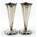 Pair of silver flower tubes, hallmarked for Walker and Hall Sheffield 1907. Both have filled bases.