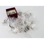 Silver. A collection of twenty-five pieces of silver & white metal jewellery, including, rings,