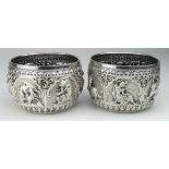 Two Burmese unmarked silver bowls showing various dieties. Each measure 6cm in height & 9cm in