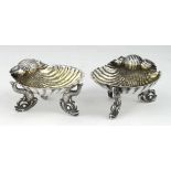 Two Victorian silver shell salts on dolphin feet. Both salts hallmarked for George Unite,