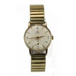Gents 9ct cased Smiths Deluxe" wristwatch, The cream dial with Arabic/baton markers with