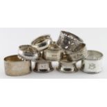 Nine silver napkin rings, eight fully hallmarked and and just marked "silver". Weighs 4.75oz approx.