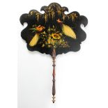 Pair of Victorian papier mache fans, with floral and bird decoration, on turned wooden handles,