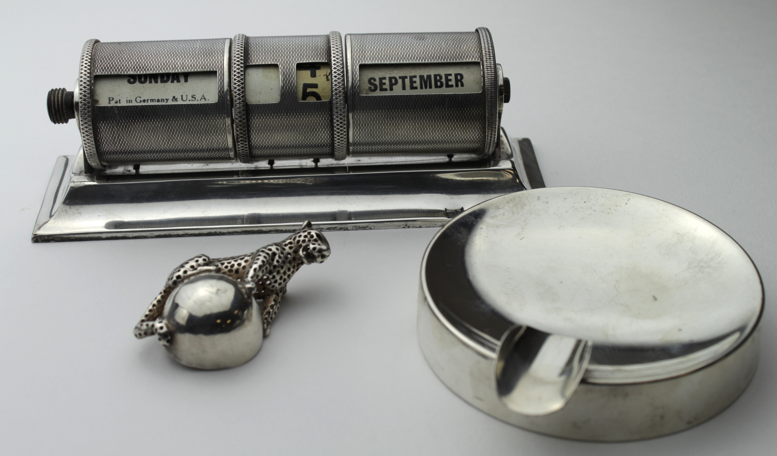 Silver desk calendar, hallmarked 'Mappin & Webb, London 1936', height 4.5cm, length 14cm approx.,