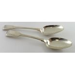 Two silver Fiddle Pattern dessert spoons, hallmarked London, 1813 and 1847 respectively. Weight of