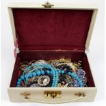 Jewellery box containing a selection of gold / yellow metal along with various silver / costume