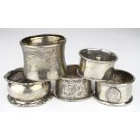 Five silver napkin rings (four with British hallmarks - various, one marked 800 (probably German).