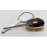 Two piece silver & tortoiseshell (poss.) dressing table set, comprising hairbrush & hand mirror,