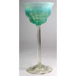 Tiffany. A Tiffany favrile green pastel glass goblet, with a swirled opalescent foot, signed to base