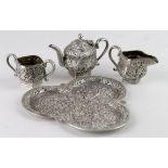Indian miniature unmarked three piece silver tea-set and tray. Weighs 5oz approx.