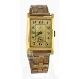 Gents 18ct cased Omega wristwatch circa 1923 - 1928. The gilt rectangular dial with black arabic