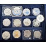 Coins, blue coin case containing 13 uncirculated coins, 2 GB £5 coins, 1 USA gold plated 2005 Silver