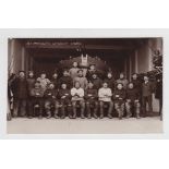 Postcard, Norfolk, RP showing Great Yarmouth Lifeboat Crew seated outside premises with Lifeboat