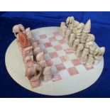 Collectables, Soapstone Maasai Warrior chess set. Rose and cream soapstone board and figures