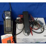 Collectables, a boxed NEC TR5E1320-9A mobile phone with car mounting kit, operator's handbook and